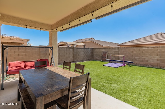 view of patio / terrace featuring a fenced backyard and outdoor dining space