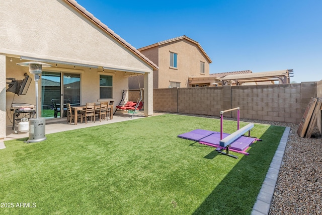 view of yard featuring a patio and a fenced backyard