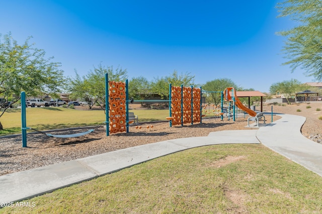 community play area with a yard