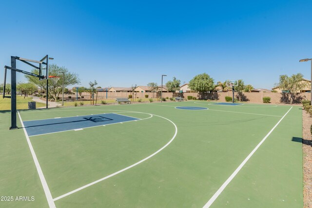 view of sport court featuring community basketball court and fence