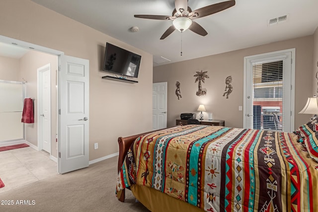 carpeted bedroom featuring visible vents, baseboards, and a ceiling fan