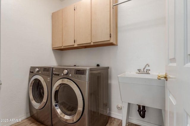 12841 N 19th St, Phoenix, AZ 85022 - clothes washing area with washing machine and clothes dryer, cabinet space, and baseboards