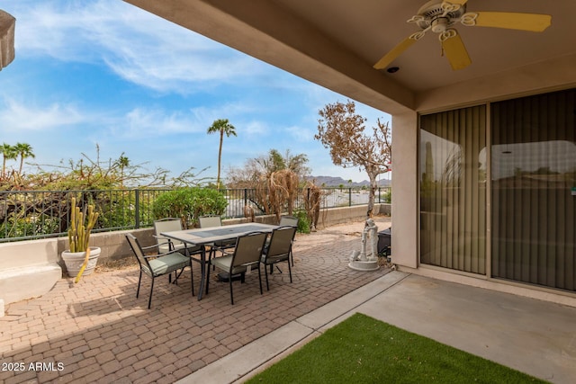 12841 N 19th St, Phoenix, AZ 85022 - view of patio / terrace with fence, ceiling fan, and outdoor dining space