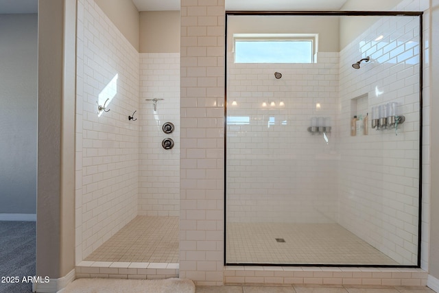 bathroom featuring tiled shower