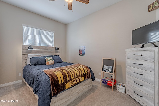 bedroom featuring ceiling fan, carpet floors, and baseboards