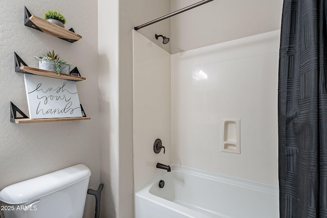 bathroom with toilet and shower / tub combo with curtain