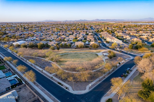 birds eye view of property with a residential view and a mountain view