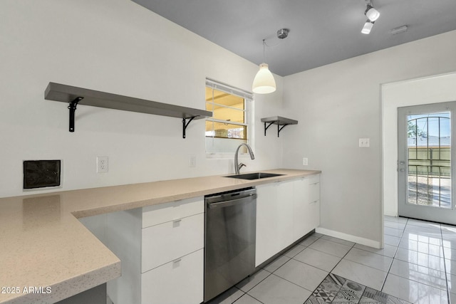 kitchen featuring dishwasher, white cabinetry, a sink, open shelves, and pendant lighting