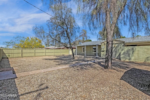 view of yard featuring a fenced backyard