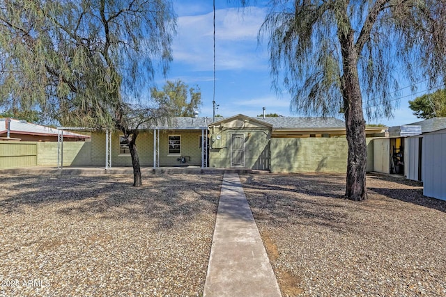 view of front of home with fence