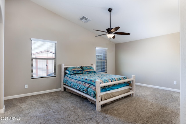 carpeted bedroom with ceiling fan and lofted ceiling