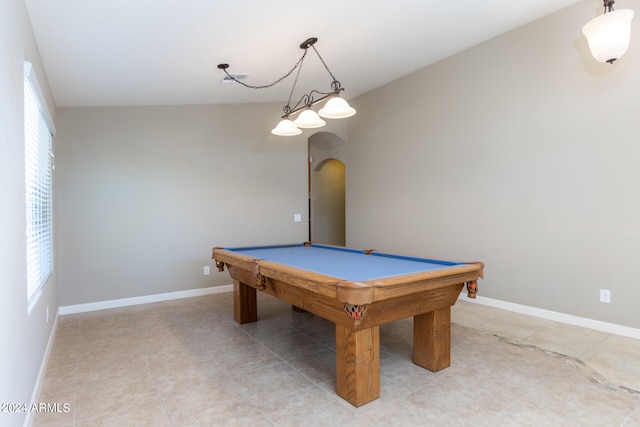 rec room featuring light tile patterned floors, plenty of natural light, vaulted ceiling, and pool table