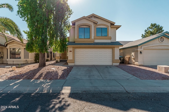 front of property featuring a garage