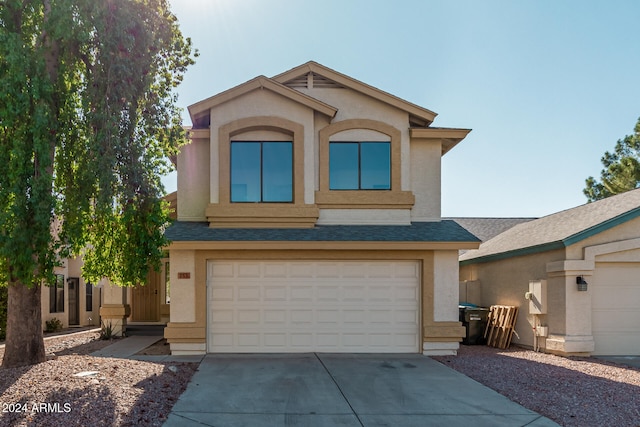 view of front of property with a garage