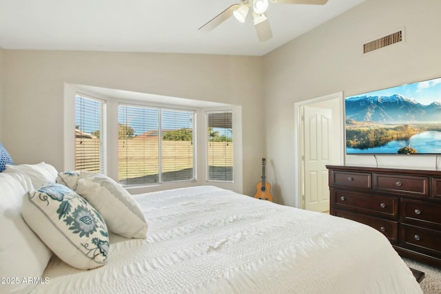 bedroom featuring ceiling fan and vaulted ceiling