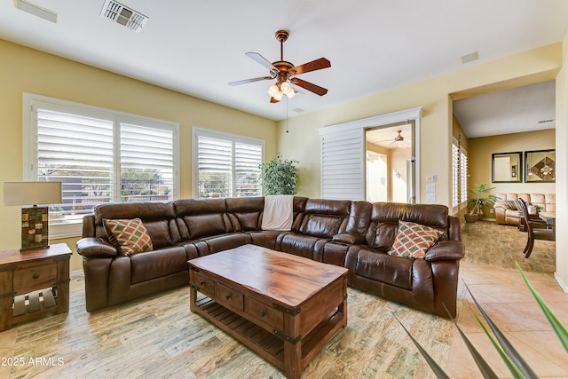 living room with ceiling fan