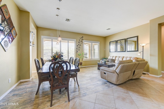 dining room with light hardwood / wood-style flooring