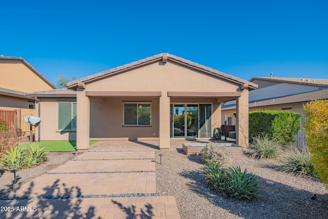 rear view of property with a patio