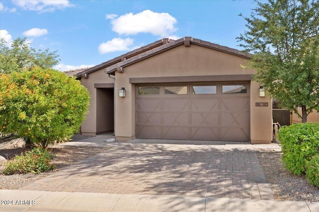 view of front of home with a garage