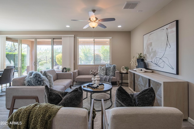 living room featuring ceiling fan