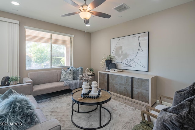 living room featuring ceiling fan