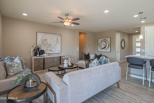 living room with ceiling fan