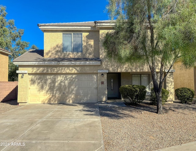 view of front of property with a garage