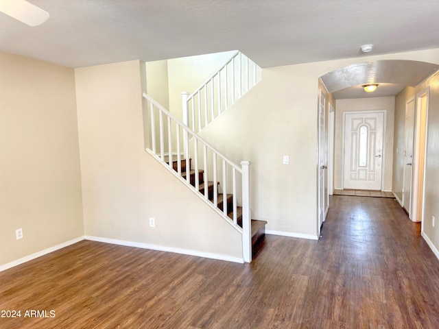 entryway with dark hardwood / wood-style floors