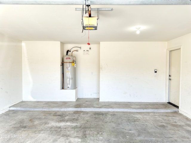 garage with a garage door opener and water heater