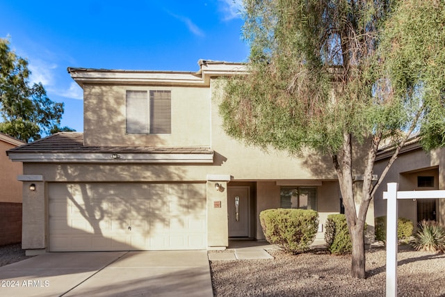 view of front of home with a garage