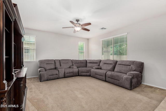 1876 E Azalea Ct, Gilbert, AZ 85298 - living room with a ceiling fan, light colored carpet, and plenty of natural light