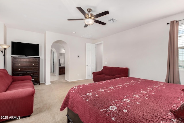 1876 E Azalea Ct, Gilbert, AZ 85298 - carpeted bedroom with arched walkways, baseboards, a ceiling fan, and ensuite bath
