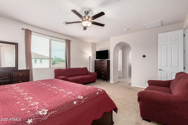 1876 E Azalea Ct, Gilbert, AZ 85298 - carpeted bedroom with arched walkways, a ceiling fan, and baseboards