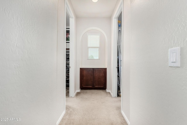 1876 E Azalea Ct, Gilbert, AZ 85298 - hallway featuring light carpet and baseboards