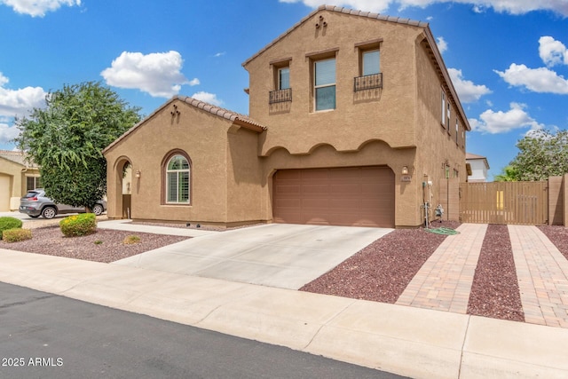 1876 E Azalea Ct, Gilbert, AZ 85298 - mediterranean / spanish home with stucco siding, fence, and a garage