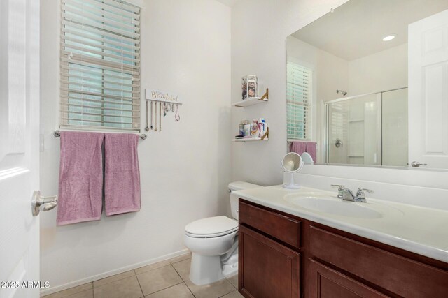 1876 E Azalea Ct, Gilbert, AZ 85298 - bathroom featuring a shower stall, tile patterned flooring, toilet, vanity, and baseboards