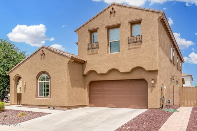 1876 E Azalea Ct, Gilbert, AZ 85298 - mediterranean / spanish home with stucco siding, driveway, and fence