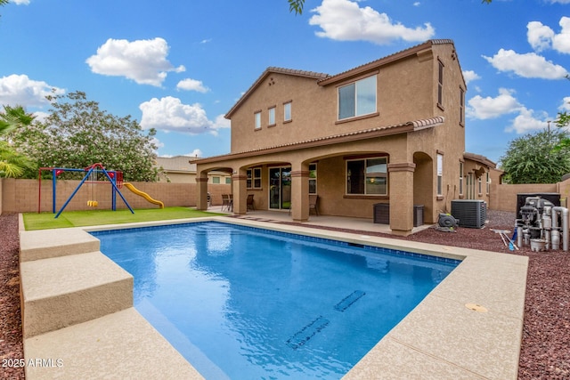 1876 E Azalea Ct, Gilbert, AZ 85298 - view of pool featuring a patio, cooling unit, a fenced backyard, and a playground
