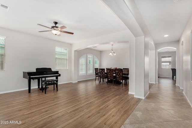 1876 E Azalea Ct, Gilbert, AZ 85298 - entryway with arched walkways, baseboards, ceiling fan, light wood-style floors, and recessed lighting