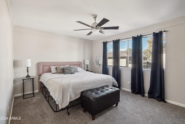 bedroom featuring ceiling fan, carpet flooring, and ornamental molding