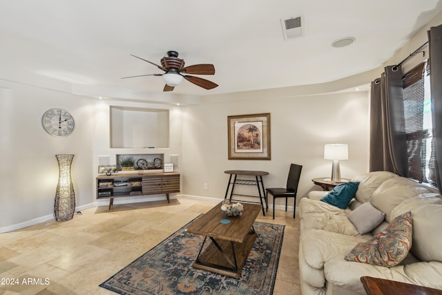 living room featuring ceiling fan