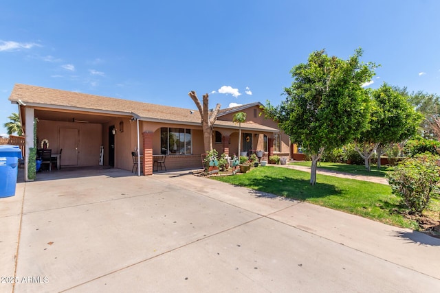 2207 N 53rd Ave, Phoenix, AZ 85035 - single story home featuring an attached carport, concrete driveway, and a front yard