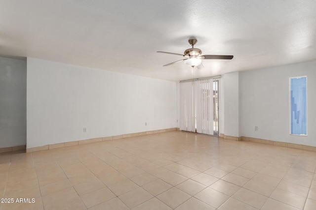 2207 N 53rd Ave, Phoenix, AZ 85035 - unfurnished room with ceiling fan and light tile patterned floors