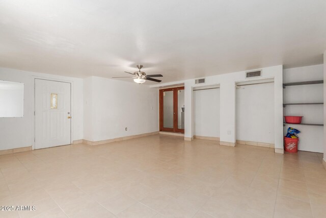 2207 N 53rd Ave, Phoenix, AZ 85035 - unfurnished living room featuring visible vents and ceiling fan