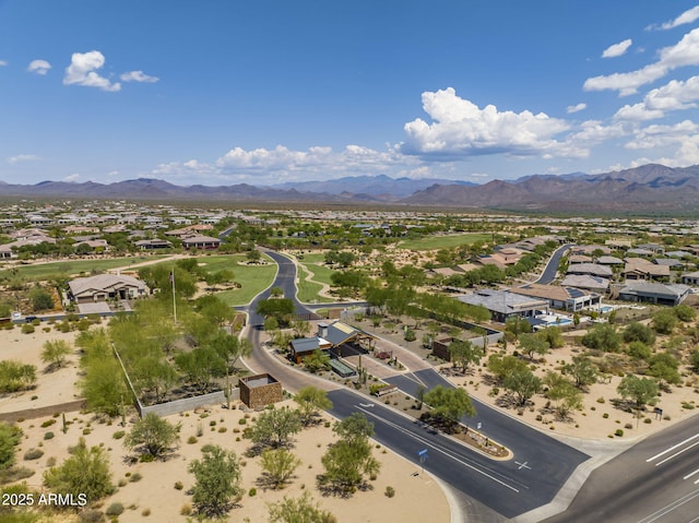 birds eye view of property with a residential view and a mountain view