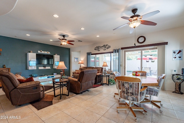 living room featuring ceiling fan and light tile patterned floors