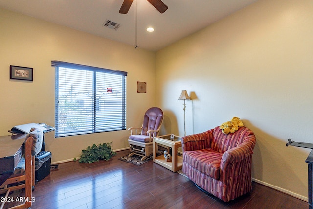 sitting room with ceiling fan and dark hardwood / wood-style floors