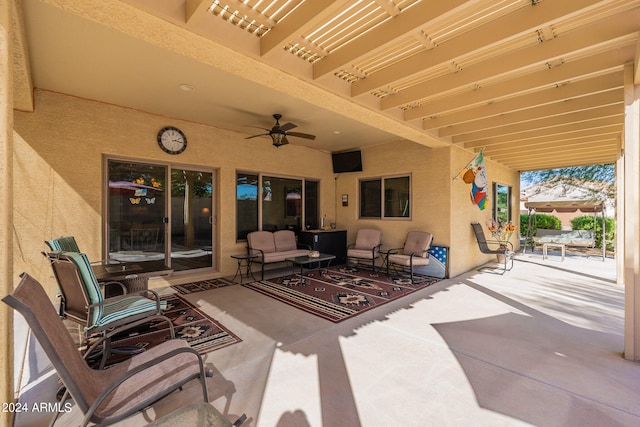 view of patio / terrace with ceiling fan and a pergola