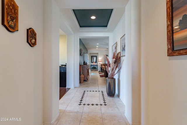 corridor with light tile patterned floors