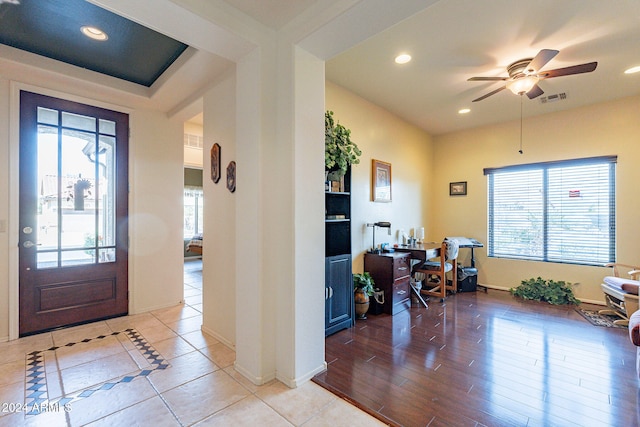 entrance foyer with ceiling fan and light hardwood / wood-style floors